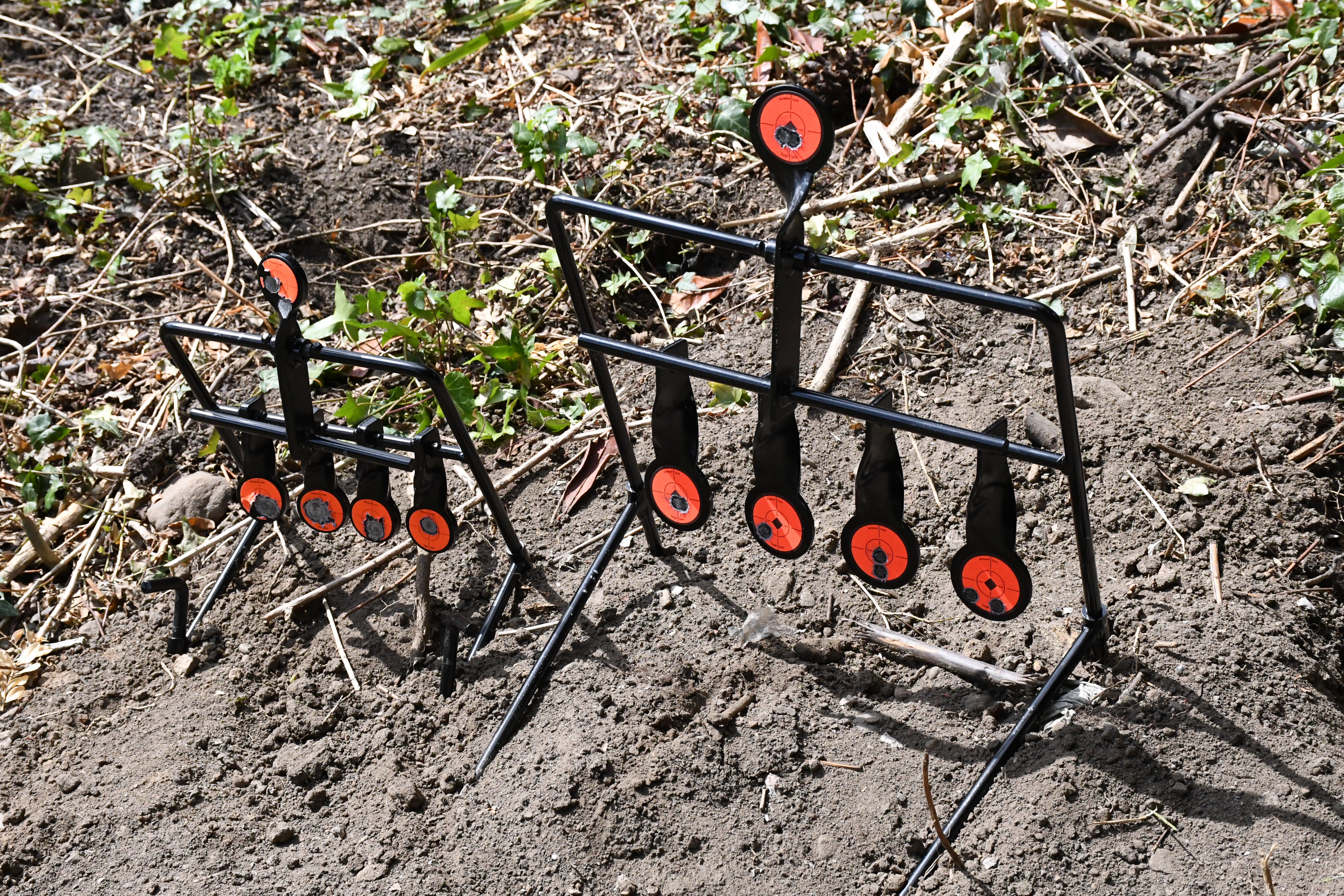 A close-up view of the Birchwood Casey Gallery .22 target showing the four lower gongs and one upper reset gong.