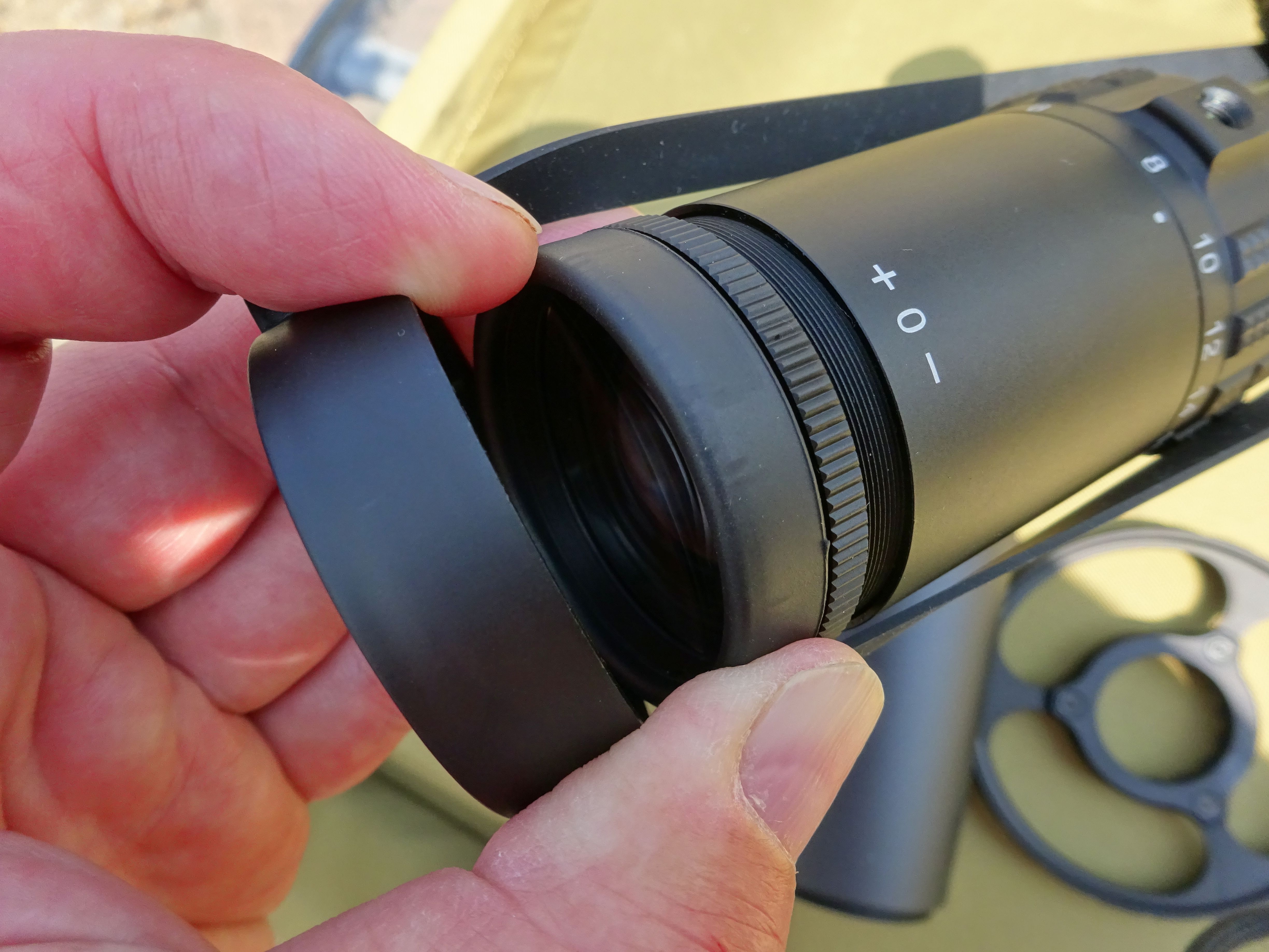 The ocular end of the scope showing the rubber-coated fast focus bell and elasticated lens cover.