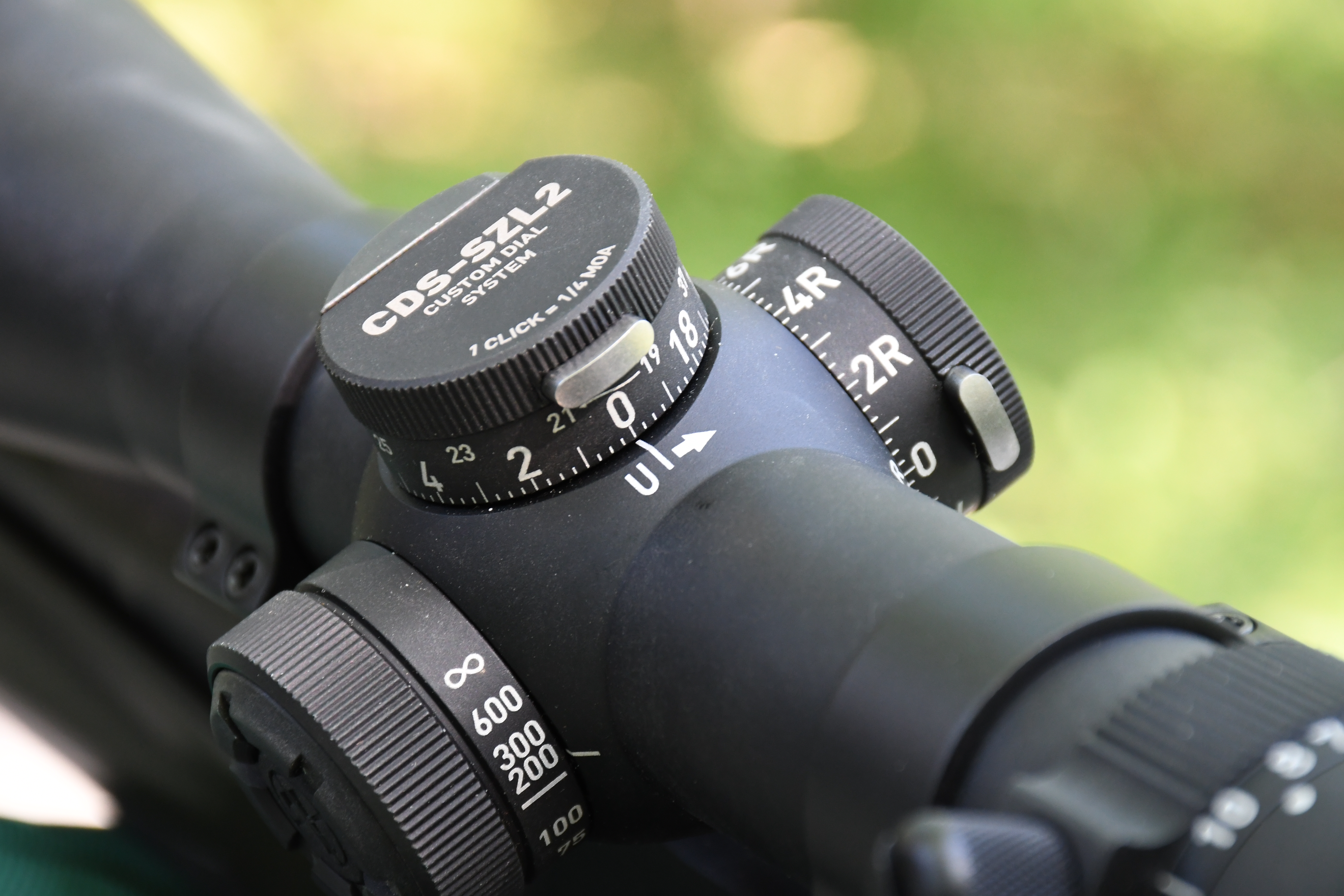 Close-up of the Leupold CDS turret push-button lock