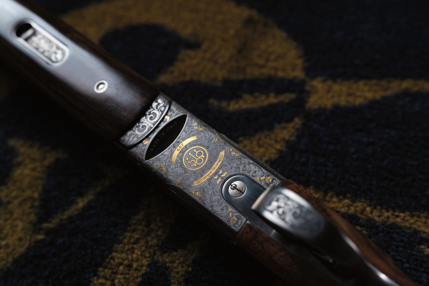 Top view of the Beretta 687 500 Years LE action and rib with the Beretta logo picked out in gold