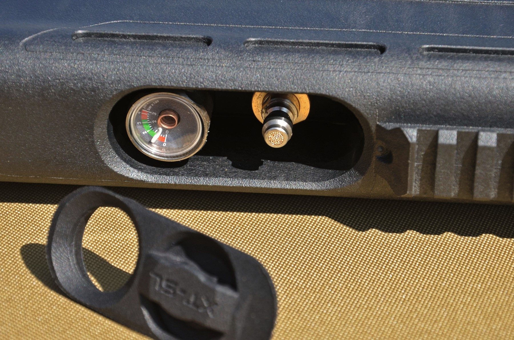 The filtered Foster fill valve and manometer recessed into the underside of the BSA XT-SL forend