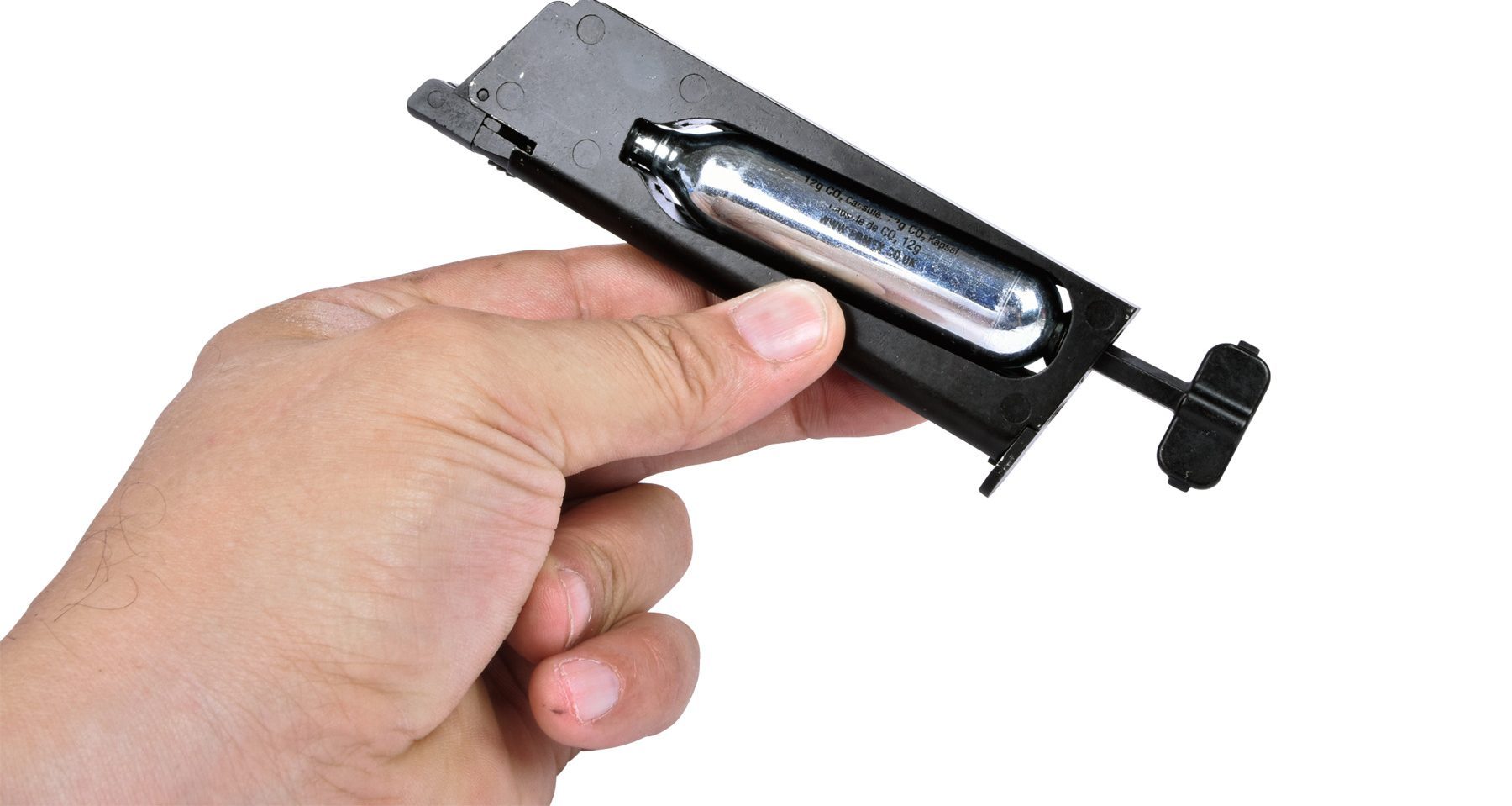 Using the supplied Allen key to tension and pierce the 12g CO2 cartridge in the ES1911 magazine