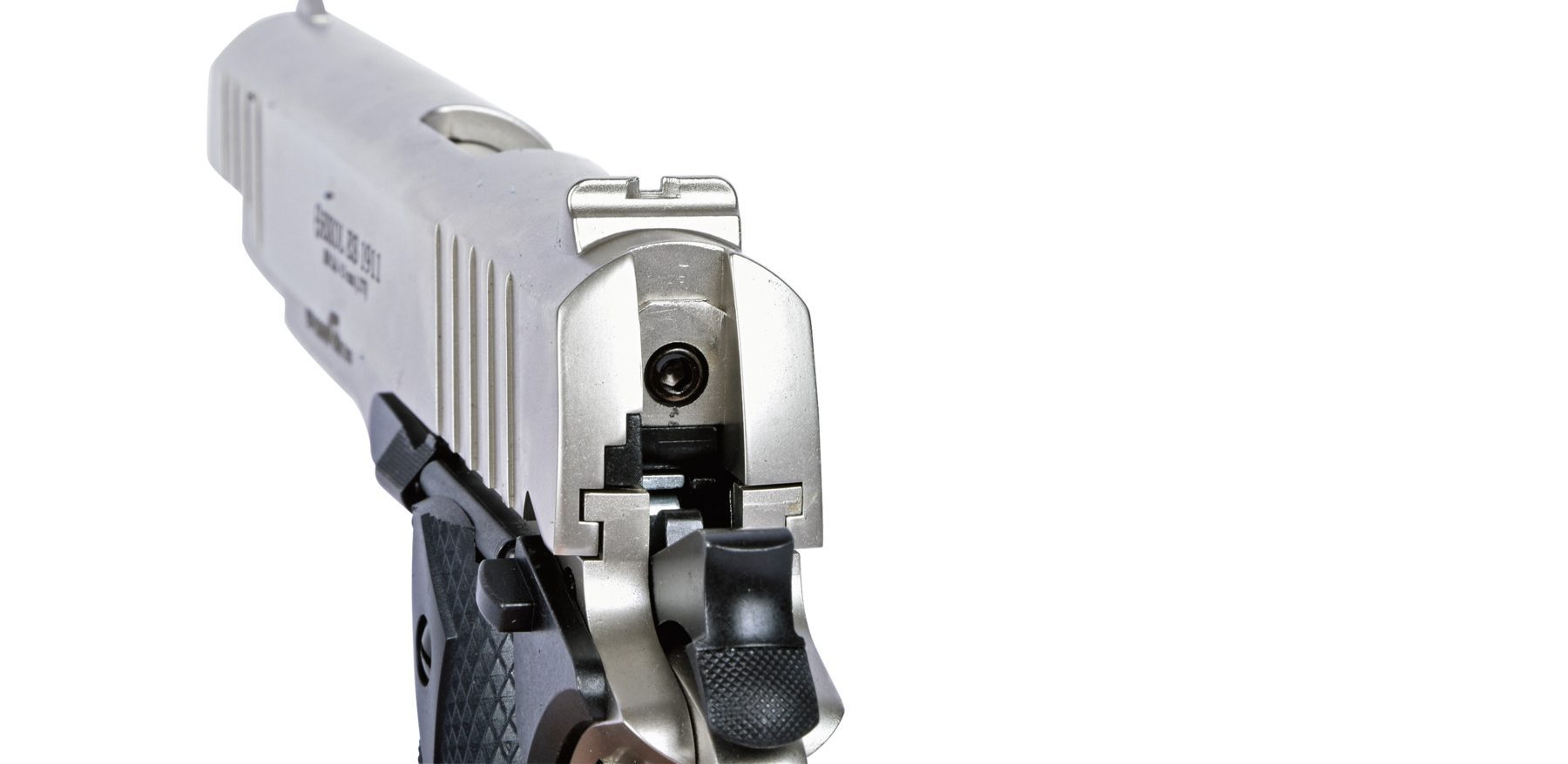 The fixed front and rear sights on the Ekol ES1911, finished in the same colour as the frame