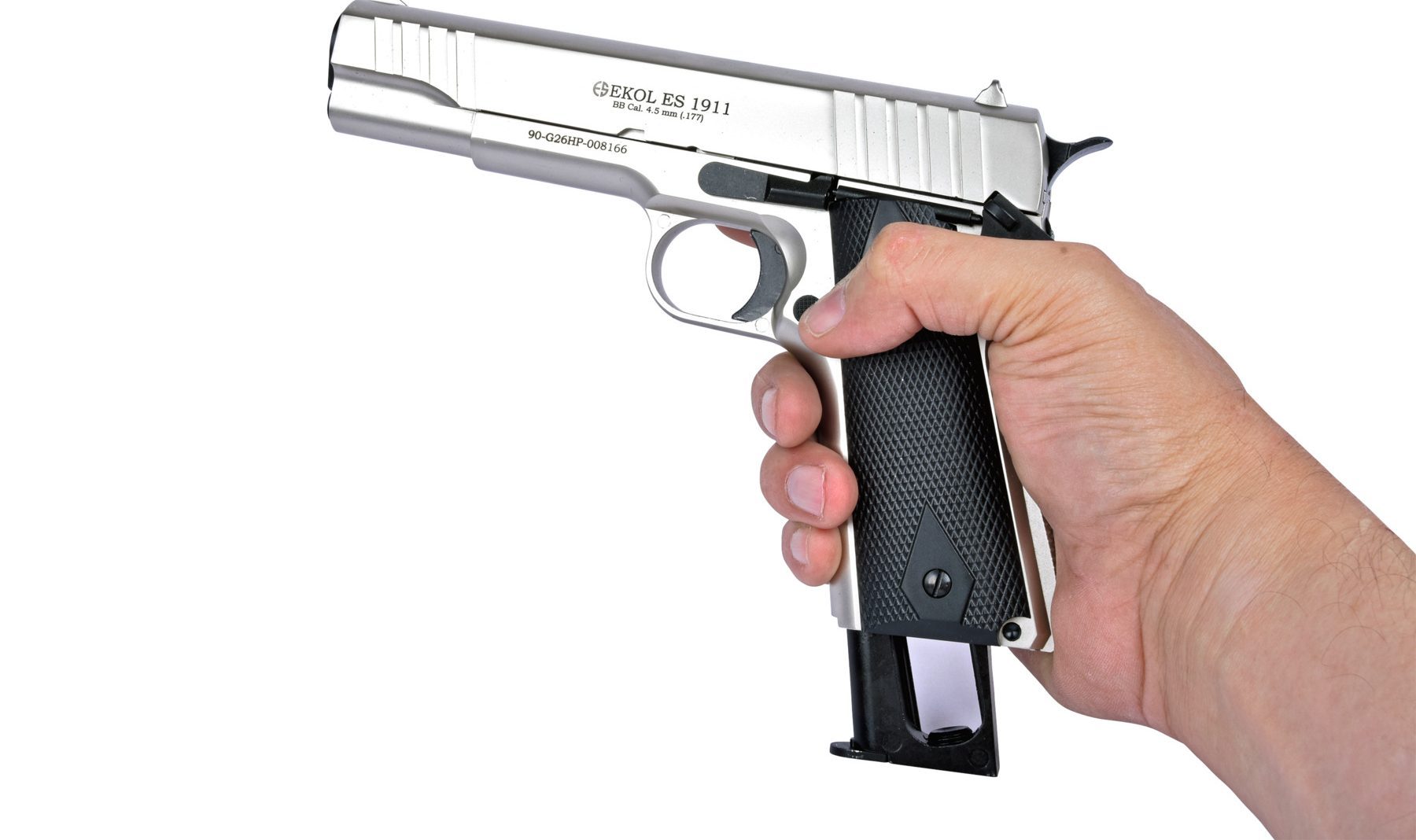 Depressing the chequered magazine release button on the grip of the Ekol ES1911