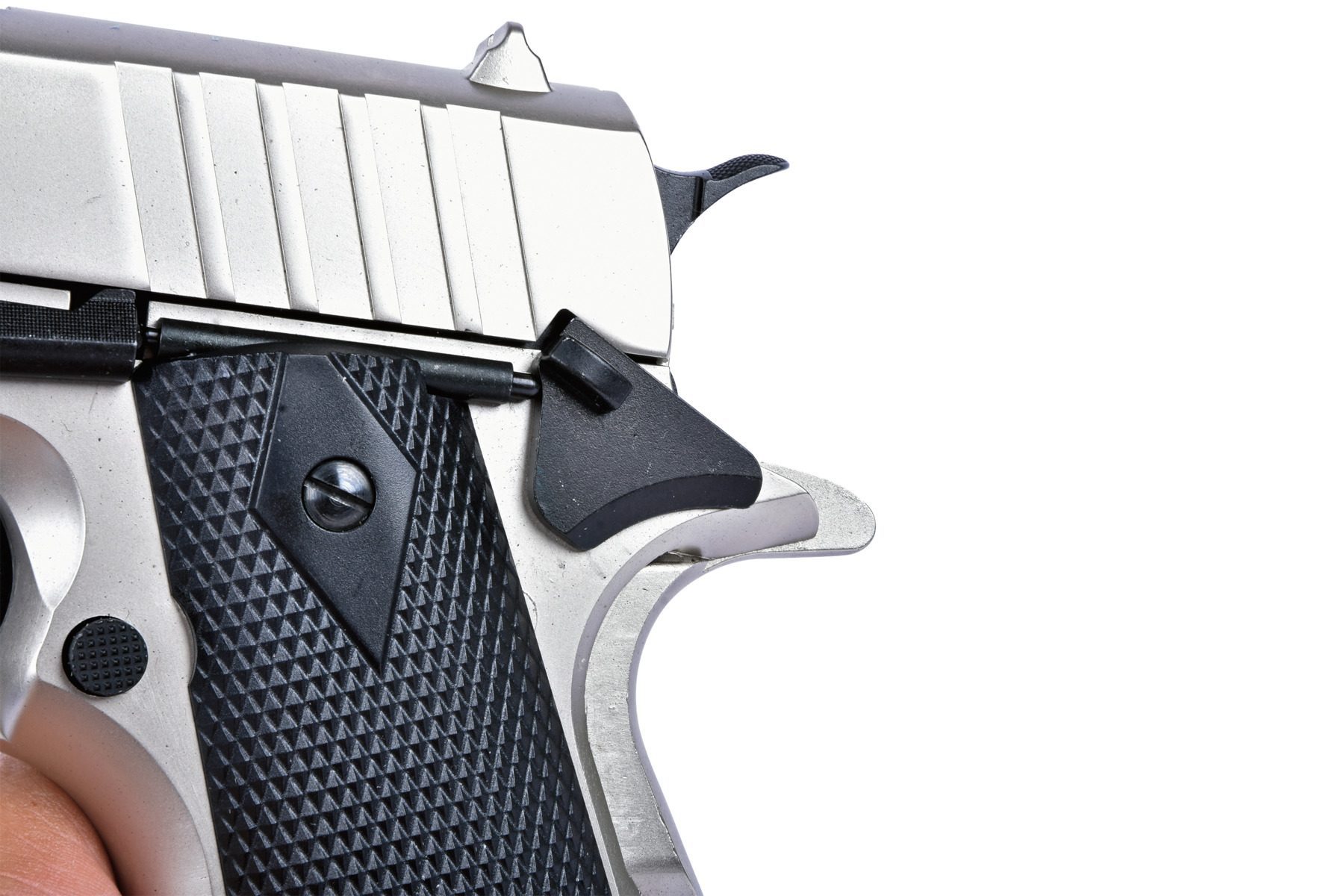 The manual safety lever at the rear of the Ekol ES1911 CO2 pistol frame