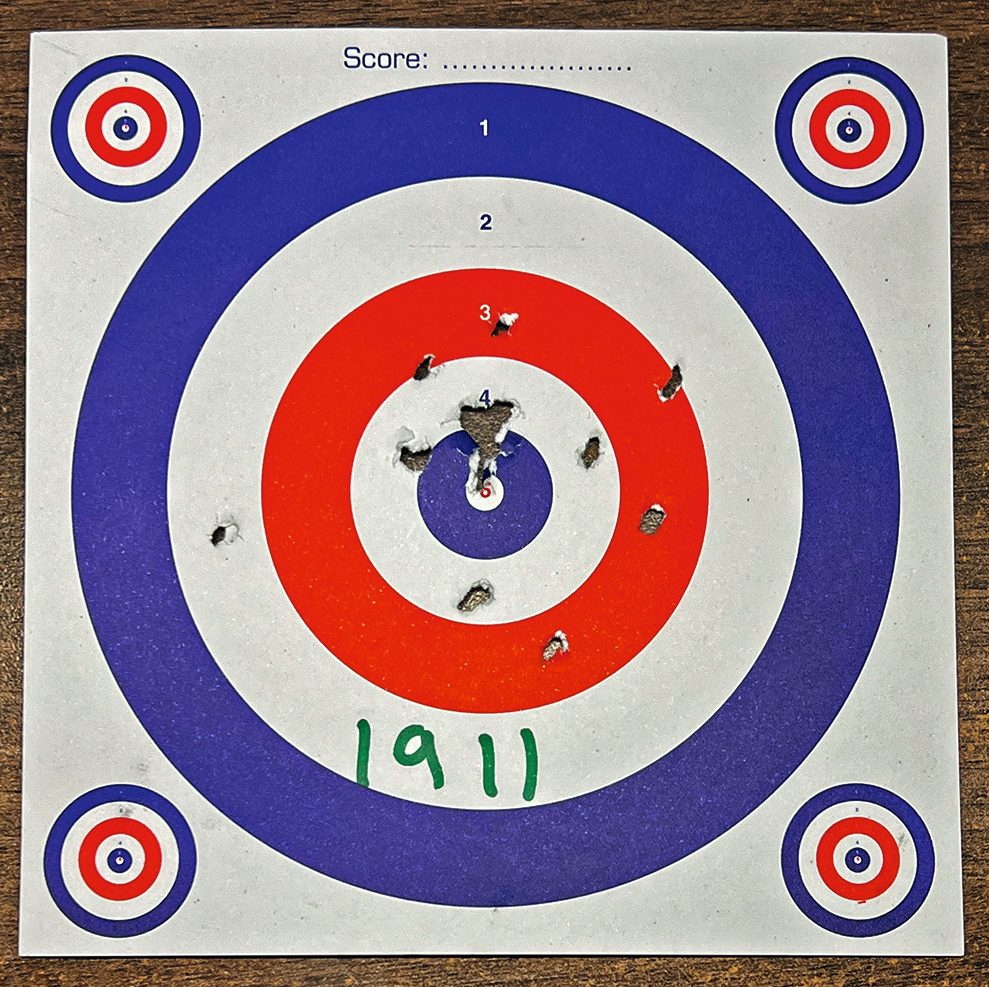 A target card shot with the Ekol ES1911 at 7m, marked 1911