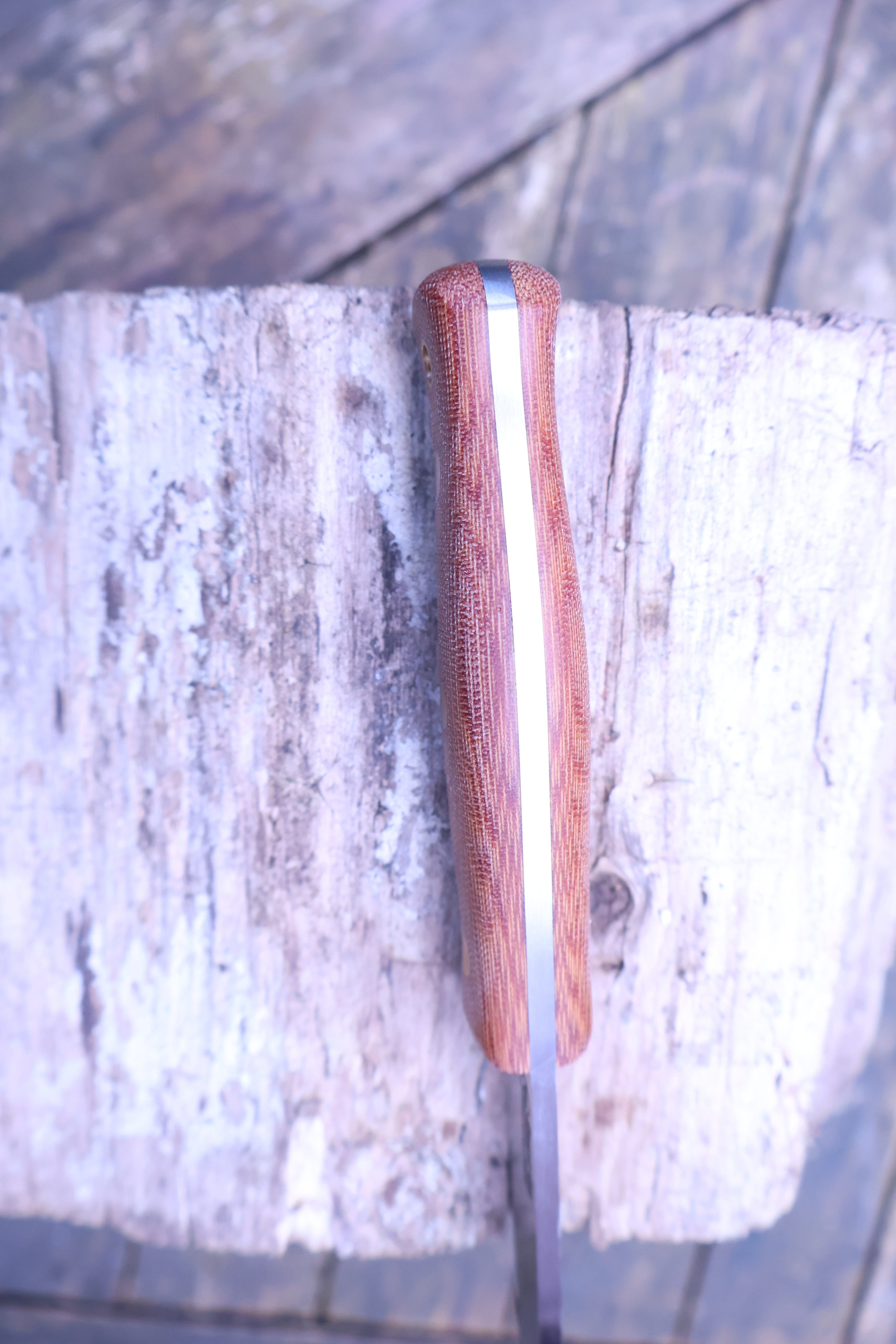 A close-up of the high-quality, vegetable-tanned European leather sheath.