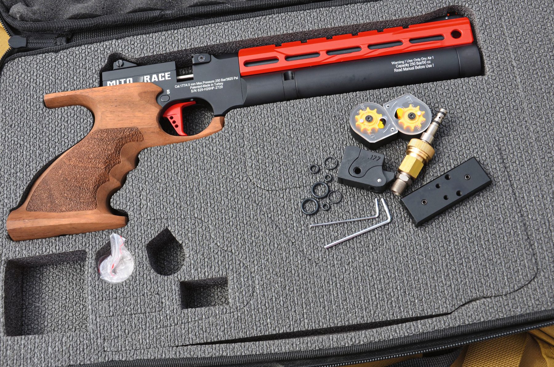 The Reximex Mito Race in its open case with magazines, tools and accessories